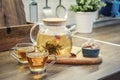 Blooming flowering tea in glass teapot Royalty Free Stock Photo
