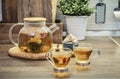 Blooming flowering tea in glass teapot Royalty Free Stock Photo