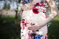 Blooming garden, Beautiful pregnant woman Royalty Free Stock Photo