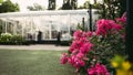 Blooming pink flowers in the garden of a Glass house in Casa Loma, Toronto, Canada Royalty Free Stock Photo