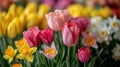 Blooming tulips, daffodils, and Easter lilies in a vibrant springtime arrangement