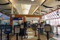 People going through TSA security screening a busy international airport