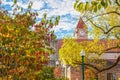 Clock tower and buildings on campus of Indiana University in Bloomington Indiana with fall foliage Royalty Free Stock Photo