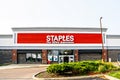 2021_08-01 Bloomington USA - Front of Staples-The Office Superstore with doors open and shopping cart outside.jpg Royalty Free Stock Photo