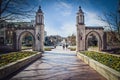 Bloomington USA Sample Gates leading out of Indiana University into downtown with students and a senior lady walking