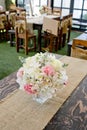 Blossom rose placed on the desk in dine room Royalty Free Stock Photo