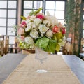 Blossom rose placed on the desk in dine room Royalty Free Stock Photo