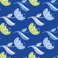 Blossom seamless pattern with green and blue tulip flowers creative silhouettes. Bright navy blue background