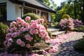 Blossoming flowers in a garden, beautiful villa in the garden