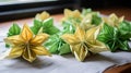 Blossoming Origami Flowers on Parchment Paper - Artistic Floral Craft Photography for Creative Projects. Royalty Free Stock Photo