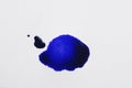 Blot of blue ink on white background, top view Royalty Free Stock Photo
