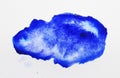 Blot of blue ink on white background, top view Royalty Free Stock Photo