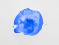Blot of light blue ink on white background, top view Royalty Free Stock Photo