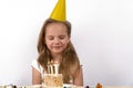 Blow out candles make a wish birthday child Royalty Free Stock Photo