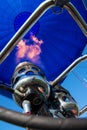 Blower and inside of a blue hot- air balloon Royalty Free Stock Photo