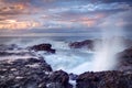 Blowhole on rocky coastline Royalty Free Stock Photo