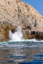 Blowhole on rugged coastline Royalty Free Stock Photo