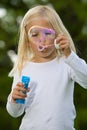 Blowing a giant soapbubble