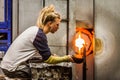 Blowing Glass Professional Woman Working on a Vase.