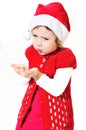 Blowing little santa Royalty Free Stock Photo