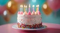 Blowing Out Candles on a Colorful Birthday Cake - Celebrating a Joyous Birthday Party Royalty Free Stock Photo