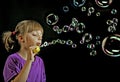 Blowing soap bubbles Royalty Free Stock Photo