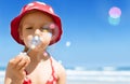 Blowing soap bubbles happy child girl,  playing, having fun on summer beach Royalty Free Stock Photo