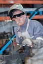 Blowtorch worker-metal worker in workshop