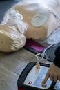 BLSD. First aid training concept. The use of an automatic external defibrillator in conducting a basic cardiopulmonary Royalty Free Stock Photo
