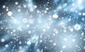 Blue abstract background. white light and snowflakes bokeh winter for Christmas new year blurred beautiful shiny lights Royalty Free Stock Photo