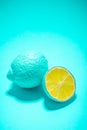 Blue Abstract Lemon Fruit Whole and Cut Half on Pastel Blue Background