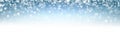 Blue abstract shiny winter banner with snowflakes.