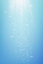 Blue abstract vertical background with sparkles. Water with bubbles and white light shining from sky vector illustration Royalty Free Stock Photo