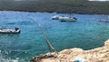 Blue adriatic sea in the bay, Rabac, istria, Croatia. Boats by the sea in summer