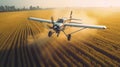 Blue agricultural aircraft plane watering a field during the daytime