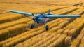 Blue agricultural aircraft plane watering a field during the daytime