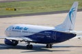 Blue Air Boeing plane doing taxi on runway