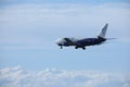 Blue Air Boeing 737-500 YR-BAG, blue sky with clouds Royalty Free Stock Photo