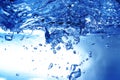 blue air bubbles under the water surface Royalty Free Stock Photo