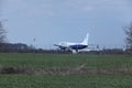 Blue Air Boeing 737-800 YR-BMF jet landing on runway Royalty Free Stock Photo