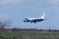 Blue Air Boeing 737-800 YR-BMF jet landing on runway Royalty Free Stock Photo