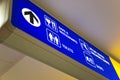 Blue airport direction sign