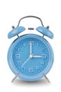 Blue alarm clock with the hands at 3 am or pm isolated on a white background