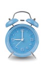 Blue alarm clock with the hands at 9 am or pm isolated on a white background