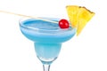 Blue alcohol cocktail with pineapple and cherry Royalty Free Stock Photo