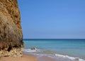 Blue Algarve beach with typical rock - Portugal