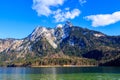 Blue Alpsee Lake in the Green Forest and Beautiful Alps Mountains. Fussen, Bavaria, Germany Royalty Free Stock Photo