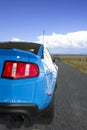 Blue American Sports Car On The Open Road