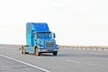 Blue american truck on road