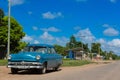 Blue american vintage car parked on the the Main Street to Santa Clara - Serie C